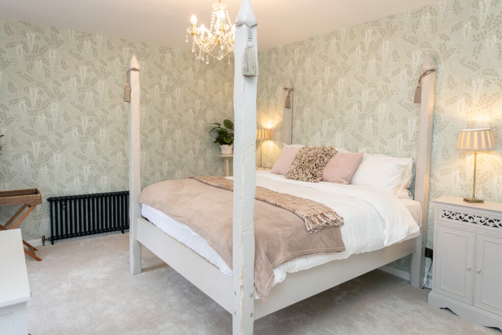 Four poster bed in one of the Limepark cottages